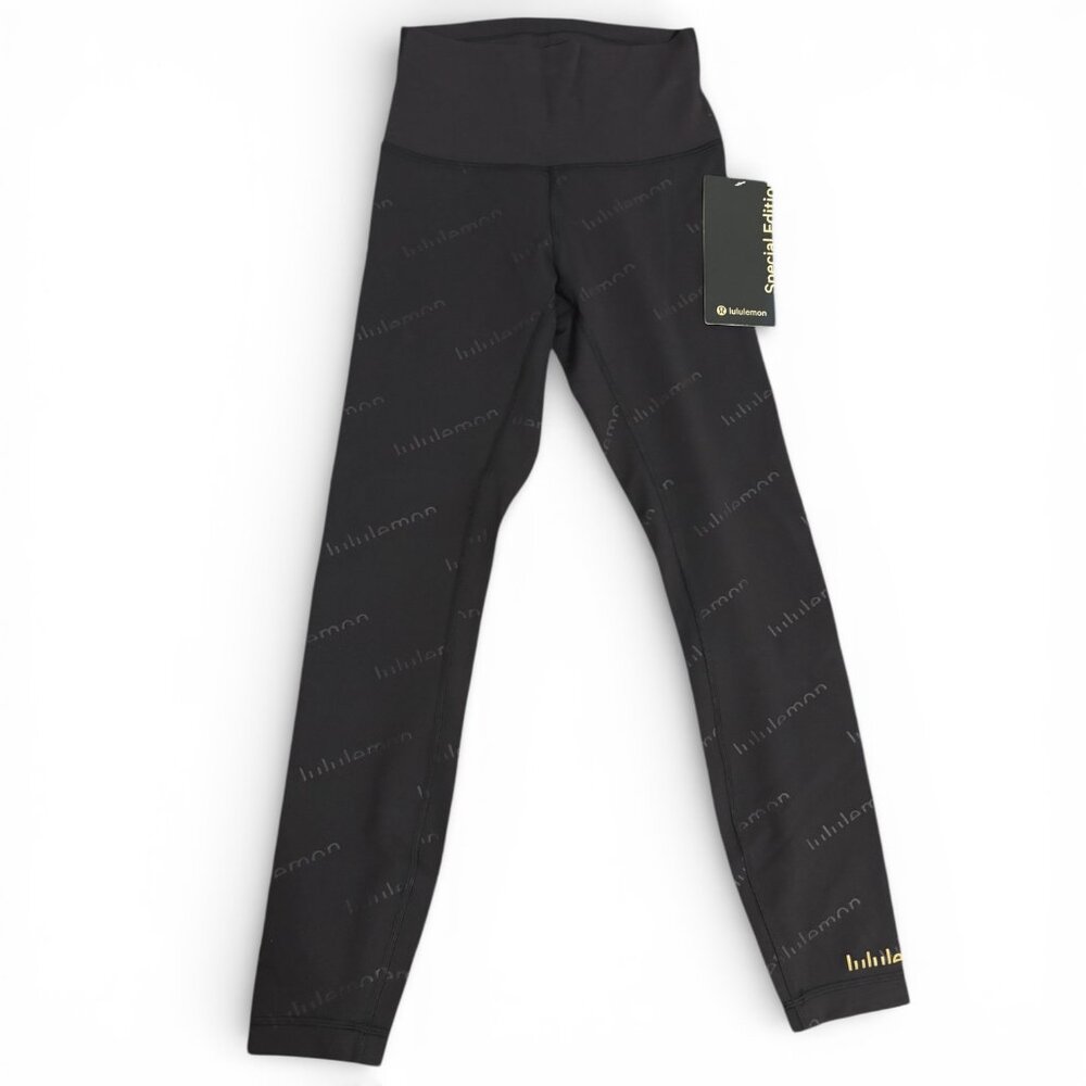 Lululemon Wunder Train High Rise 25 Tight Black Embossed Logo Gold NWT Size 4